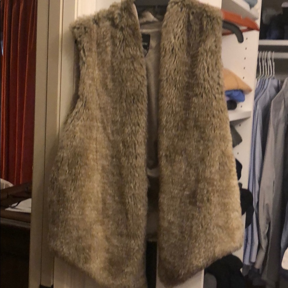 Tart fur vest